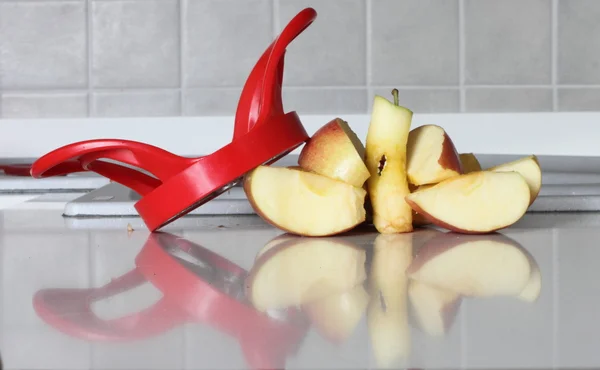 Apple and apple peeler — Stock Photo, Image