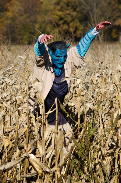 Scary blue monster in a corn maze