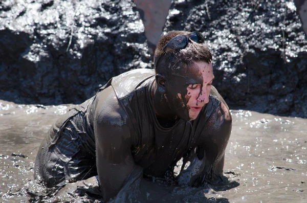 Man covered in mud — Stock Photo, Image