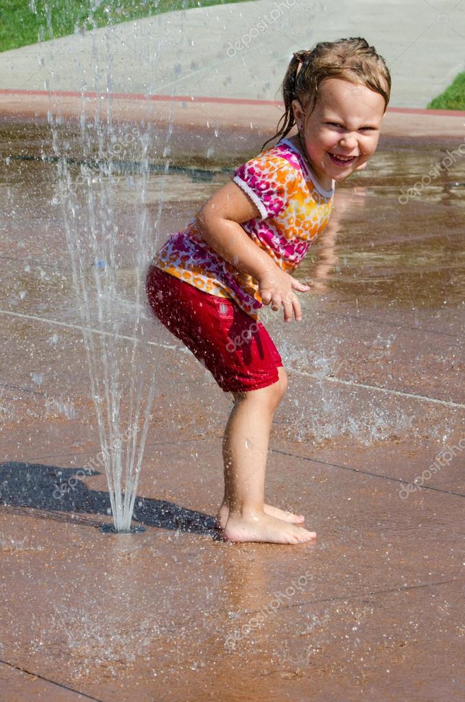 Tush tickler child in fountain — Stock Photo © inyrdreams #30767595