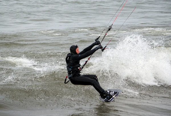 Kite boarder touching down — Stock Photo, Image