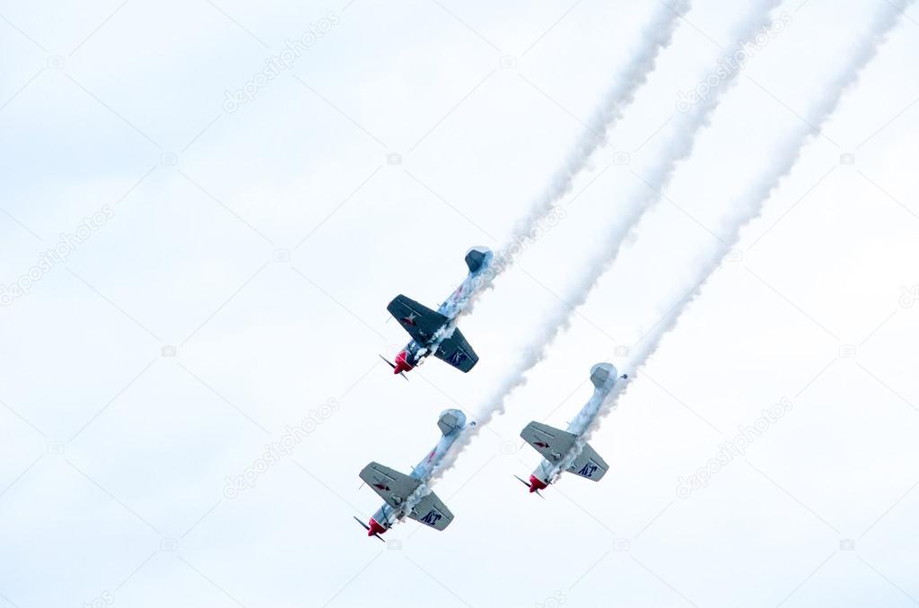 Stunt planes fly in formation