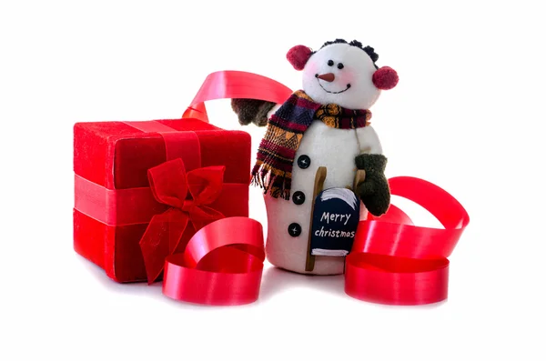 Snowman with package and ribbons on white — Stock Photo, Image