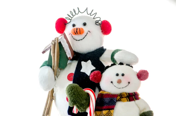 Primer plano de amigos muñeco de nieve sobre fondo blanco —  Fotos de Stock