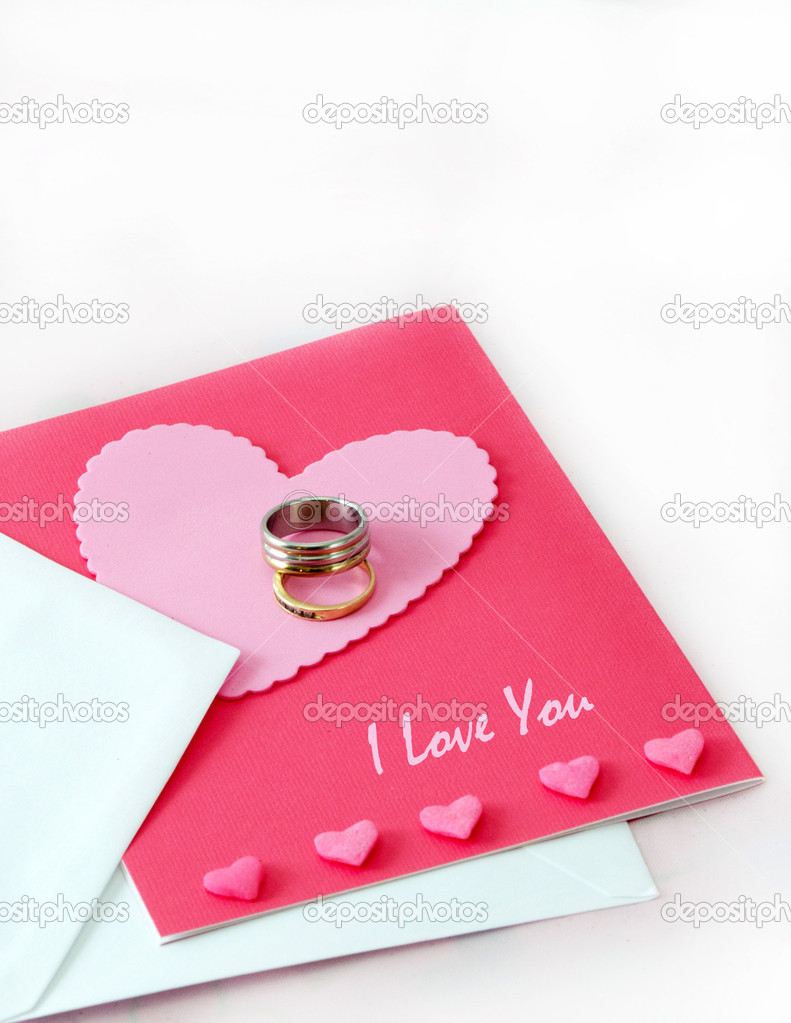 Wedding rings and a love card