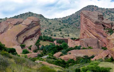 Red Rocks amphitheater in Morrison colorado, is a beautiful outdoor venue where concerts and events are held clipart