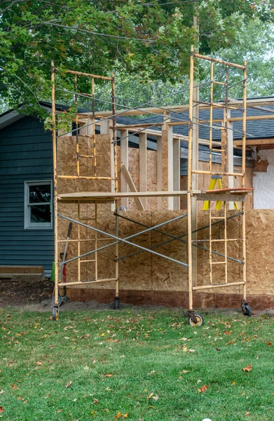 Scaffolding Erected Help Put Wood Sheeting New Room Addition — Photo