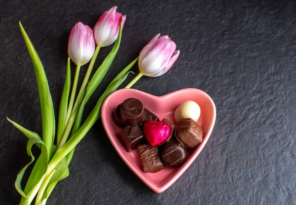 Fancy Chocolates Pink Tulips Flat Lay — Zdjęcie stockowe
