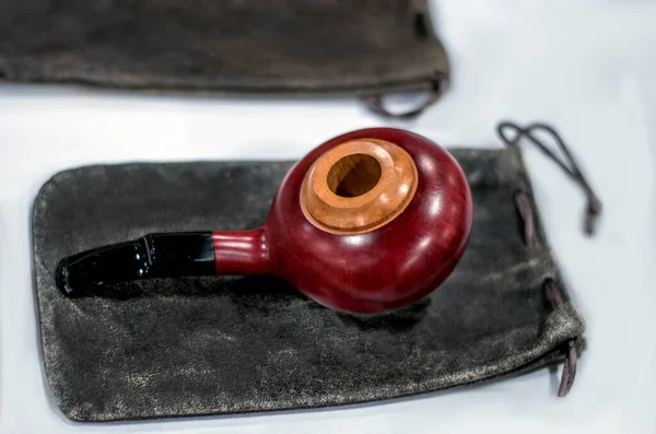 artisan pipe using different kinds of wood makes a beautiful addition to a pipe collector