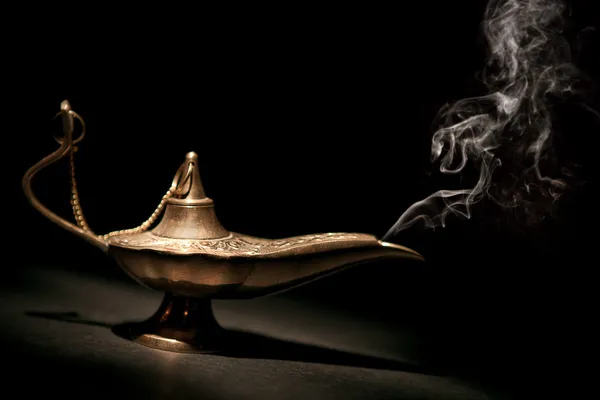 Magical Geni Lamp with Smoke and black background