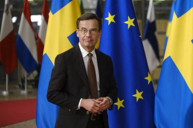 İsveç Başbakanı Ulf Kristersson, 20 Ekim 2022 'de Brüksel, Belçika' daki AB Konseyi binasında gerçekleşen toplantı öncesinde Avrupa Konseyi Başkanı Charles Michel ile birlikte yürüdü..