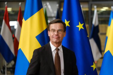 İsveç Başbakanı Ulf Kristersson, 20 Ekim 2022 'de Brüksel, Belçika' daki AB Konseyi binasında gerçekleşen toplantı öncesinde Avrupa Konseyi Başkanı Charles Michel ile birlikte yürüdü..