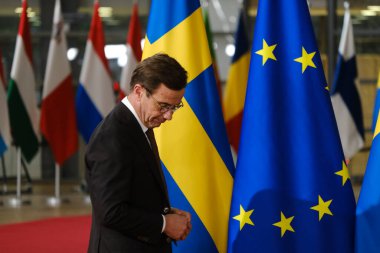 İsveç Başbakanı Ulf Kristersson, 20 Ekim 2022 'de Brüksel, Belçika' daki AB Konseyi binasında gerçekleşen toplantı öncesinde Avrupa Konseyi Başkanı Charles Michel ile birlikte yürüdü..