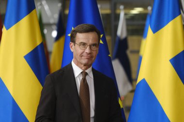 İsveç Başbakanı Ulf Kristersson, 20 Ekim 2022 'de Brüksel, Belçika' daki AB Konseyi binasında gerçekleşen toplantı öncesinde Avrupa Konseyi Başkanı Charles Michel ile birlikte yürüdü..