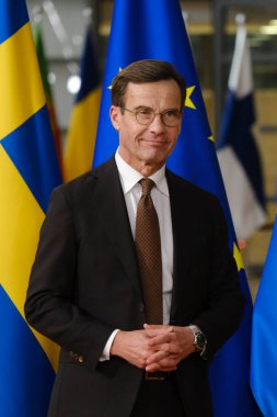 İsveç Başbakanı Ulf Kristersson, 20 Ekim 2022 'de Brüksel, Belçika' daki AB Konseyi binasında gerçekleşen toplantı öncesinde Avrupa Konseyi Başkanı Charles Michel ile birlikte yürüdü..