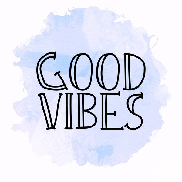 Good vibes text on abstract colorful background