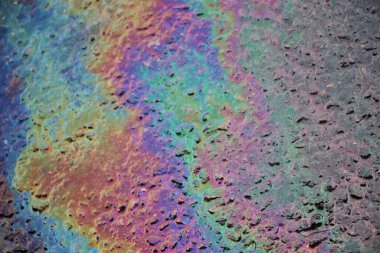 petrol sızıntısı asfalt yol arka plan veya doku.