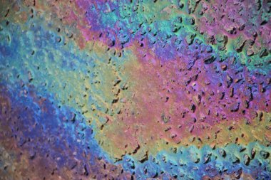 petrol sızıntısı asfalt yol arka plan veya doku.