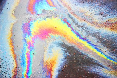 petrol sızıntısı asfalt yol arka plan veya doku.