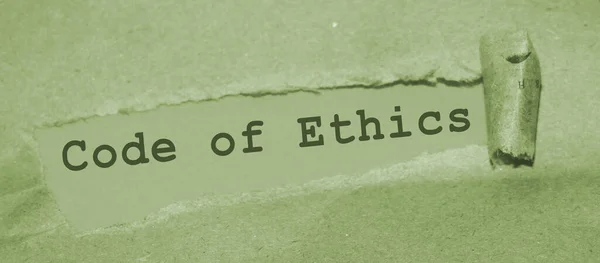 Tekst Znajdujący Się Rozdartym Brązowym Okryciem Kodeks Etyczny — Zdjęcie stockowe