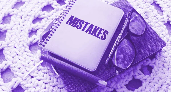 Word Mistake Word Written Notepad Eye Glasses Pen Crochet Carpet — Stock Photo, Image