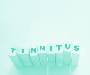 TINNITus kelimesi ahşap yapı taşlarından yapılmıştır. Tıp sağlık hizmetleri kavramı.
