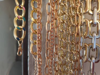 golden metal chains close-up view