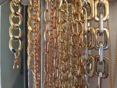golden metal chains close-up view