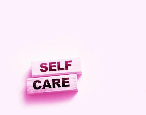 Self Care Words Printed Wooden Blocks Self Treatment Concept Pink — Stock Photo, Image