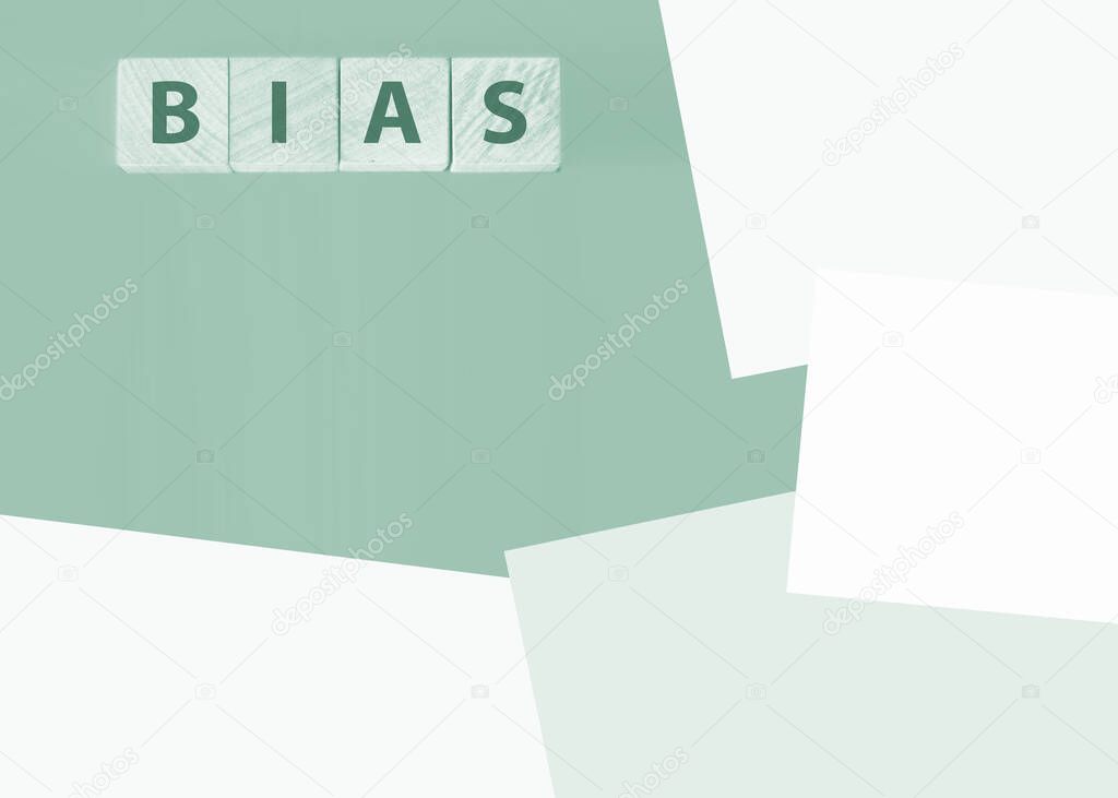 the word bias on wooden blocks blue background.