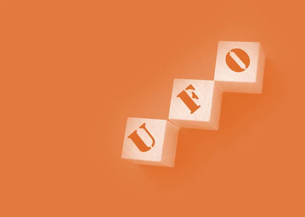Word Ufo Written Wooden Cubes Isolated Orange Background — Foto de Stock
