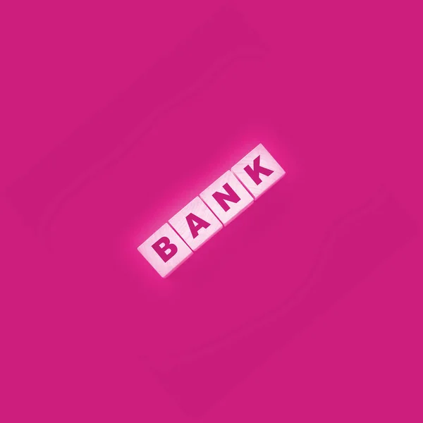 Bank Word Concept Written Wooden Cubes Pink Table Banking Saving — стоковое фото