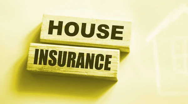 Wooden Blocks with Words House Insurance. Business Insurances business Concept to get coverage for Life, Home, Car, Travel, Medical and Dental, Personal Accident