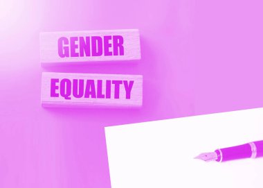 Tahta bloklarda cinsiyet eşitliği kelimeleri. Kadın ve erkek kavramları için eşit haklar.