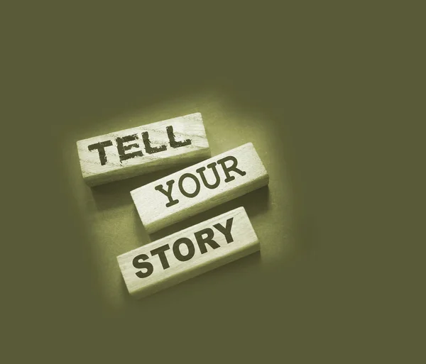 Tell your story word on wooden blocks. Testimonial examples storytelling copywriting case study education and business concept.