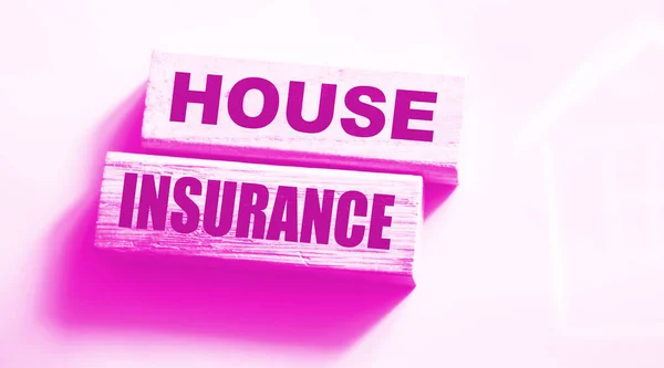 Wooden Blocks with Words House Insurance. Business Insurances business Concept to get coverage for Life, Home, Car, Travel, Medical and Dental, Personal Accident