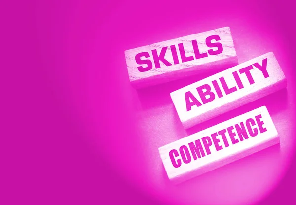 Skills ability competence words in wooden blocks concept. Career and business success concept.