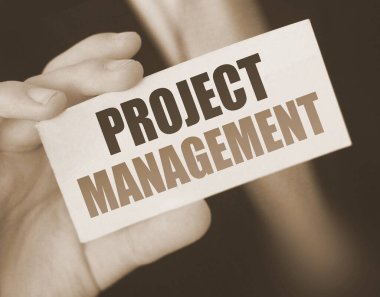 Kart işadamı tutanaklarındaki PROJECT MANAGEMENT sözcükleri. Parlak konsept.