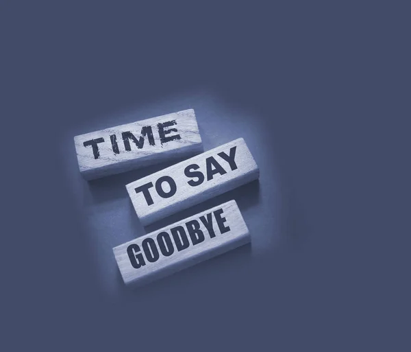 Time to Say Goodbye Message on wooden blocks. Concept Image.
