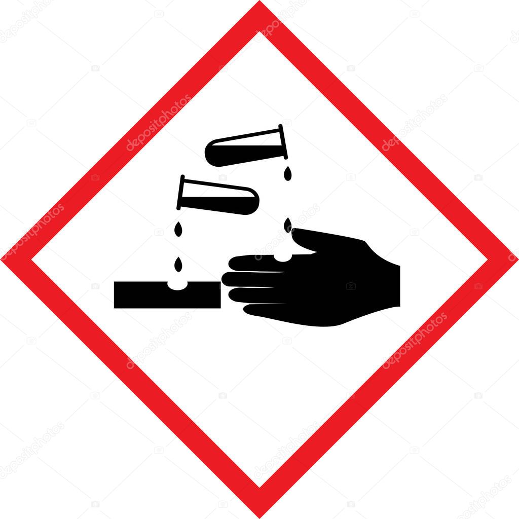 Corrosive symbol .Diamond shape red border and white background. Safety signs and symbols.