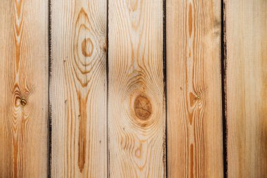 Brown wood texture. Abstract background. rustic background made of old wooden boards with holes and nails.
