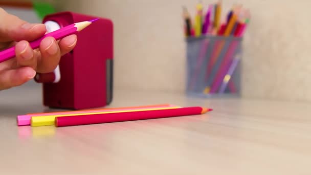 Woman Hand Holds Sharp Pencil Mechanical Sharpener Table Next Back — Stock Video