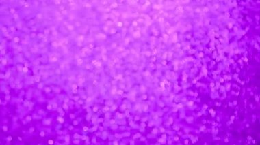 Parlak pembe ve mor arka plan malzemesi. Görüntü ve bokeh. Neşeli dokusu ışıkta parıldıyor..