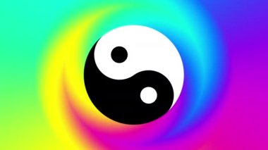 Renkli arka planda dönen yin-yang sembolü. Görüntü döngüsü.