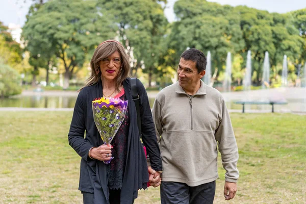 Mature Transgender Woman Walking Hand Hand Her Boyfriend Park Happy — Zdjęcie stockowe