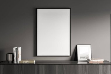 Oturma odasının iç kısmının gri duvarında boş beyaz tuval, modern büfenin üstünde kitaplar ve fotoğraf çerçevesi var. Tasarımın için model kavramı. 3d oluşturma