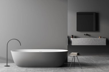 Banyo içinde modern oval küvet ve boş duvar bölmesi olan tabure var. Arka planda kare aynası olan raf süsleme alanı. Beton zemin. Minimalist tasarım konsepti. 3d oluşturma
