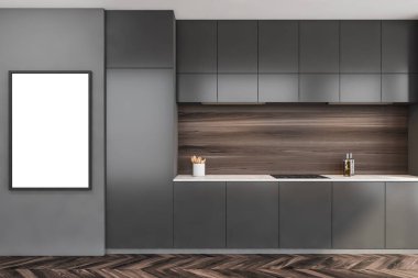Duvarda boş, beyaz bir çerçeve var. Mutfağın içinde, koyu ahşap kaplama ve parke zemin var. Modern minimalist konsepte sahip gri tasarım. 3d oluşturma
