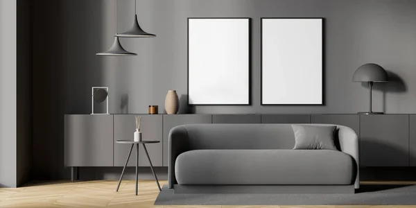 Two empty white canvases on grey wall in minimalist living room with extra long sideboard, sofa, pendant lamps and accent parquet floor. Mock up. Concept of modern house design. 3d rendering