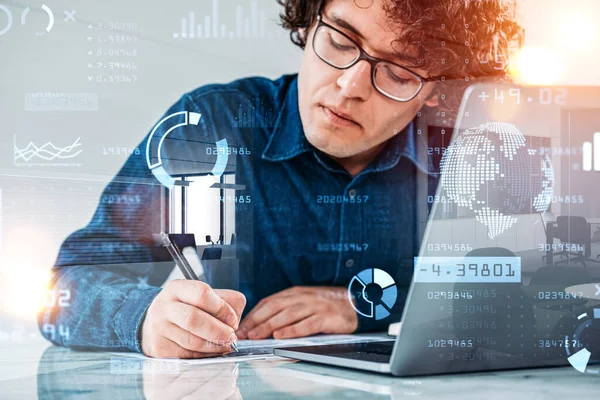 Office man writing notes with laptop on the table. Blue hologram of digital data interface, pie chart and network connection. Concept of financial analysis